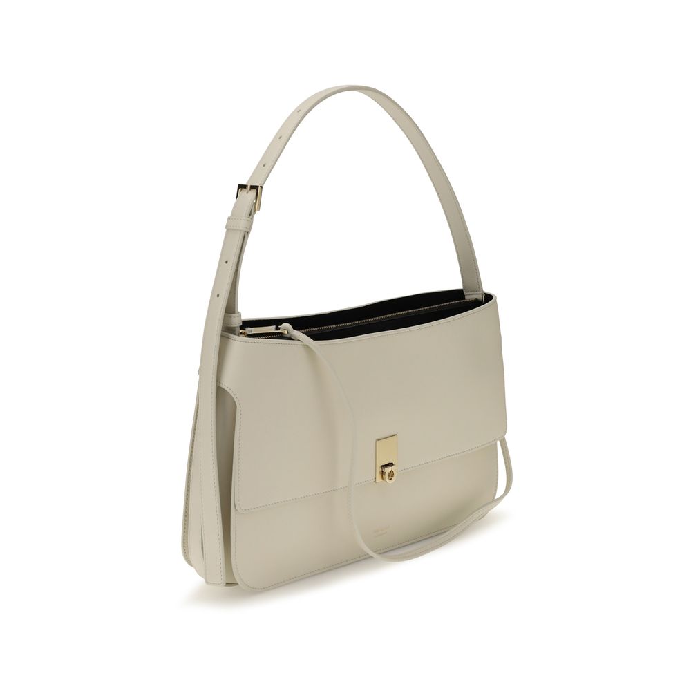 Small Shoulder Clutch Bag by Ferragamo for women in bos taurus calfskin leather beige & signature features a effortless sophistication silhouette, secured by a buckle with ample external-pockets and versatile shoulder-strap for a effortless sophistication finish.