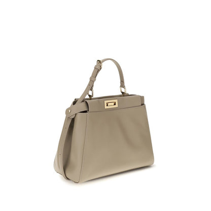 Small Shoulder Bag by Fendi for women in bos taurus calf grained leather beige, gold & signature presents a versatile silhouette, showcasing a secure and versatile with versatile shoulder-strap, adjustable-strap & handle for a sophisticated look.
