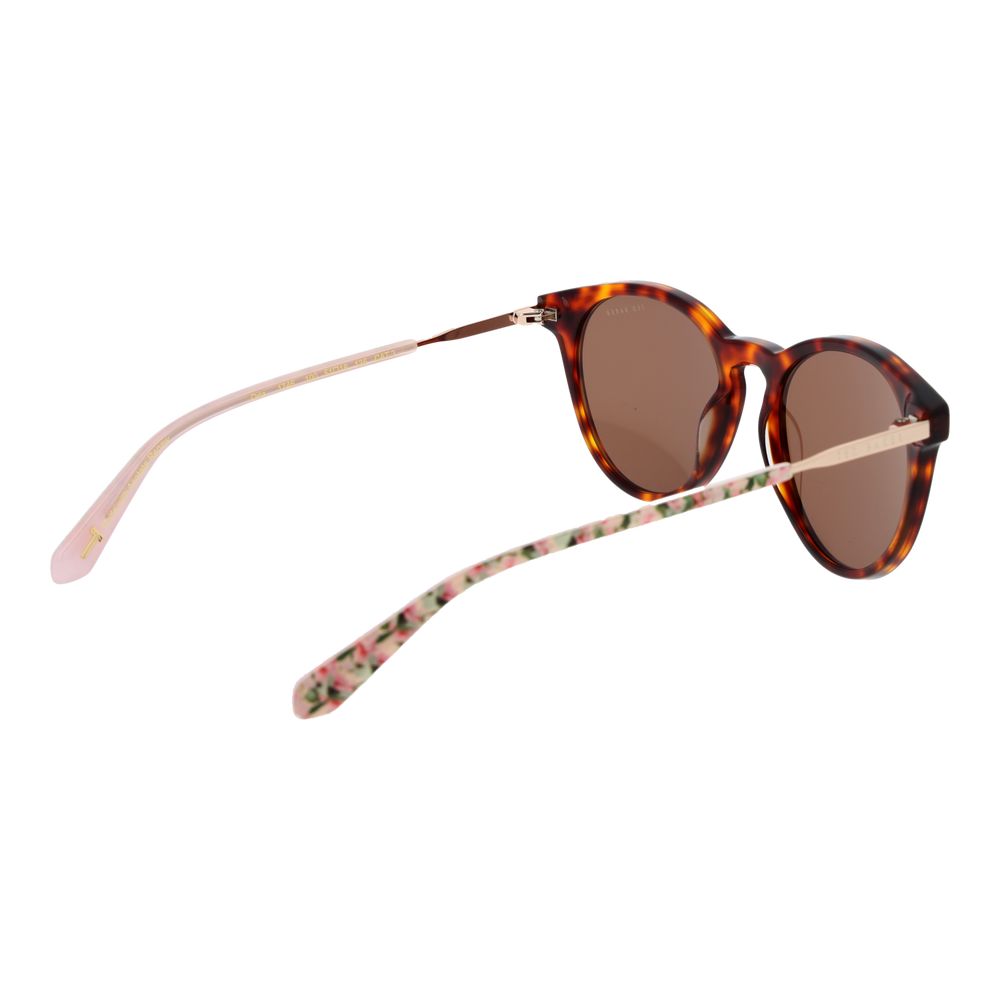 Sunglasses by Ted Baker for women in wool brown features a contemporary silhouette, showcasing a contemporary full-rim round frame design in brown coloured frame with high-performance category-3-dark-tint lens.