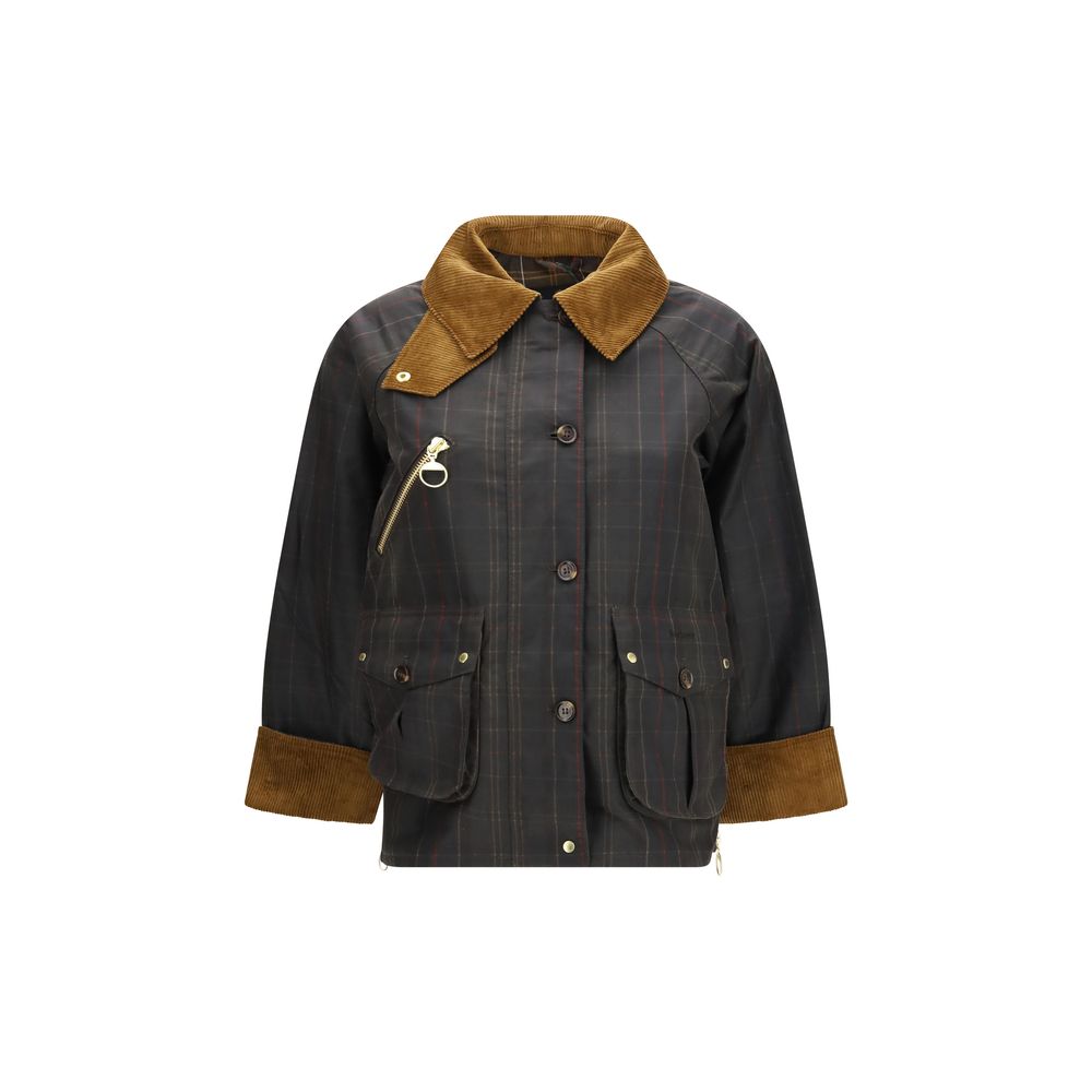 Overcoat by Barbour for women in cotton corduroy bicolour, horn, tartan & signature showcases a enveloping silhouette, detailed with distinctive pockets and a enveloping .