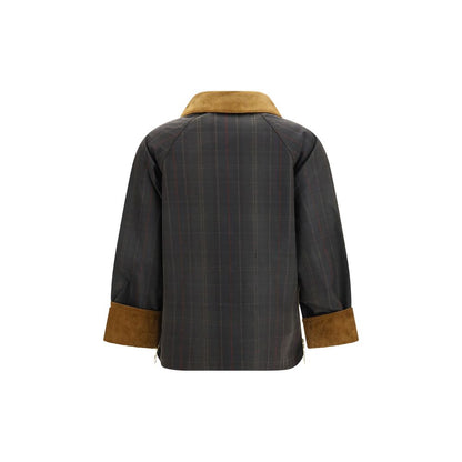 Overcoat by Barbour for women in cotton corduroy bicolour, horn, tartan & signature features an voluminous silhouette, showcasing distinct pockets and a voluminous for a truly voluminous aesthetic.