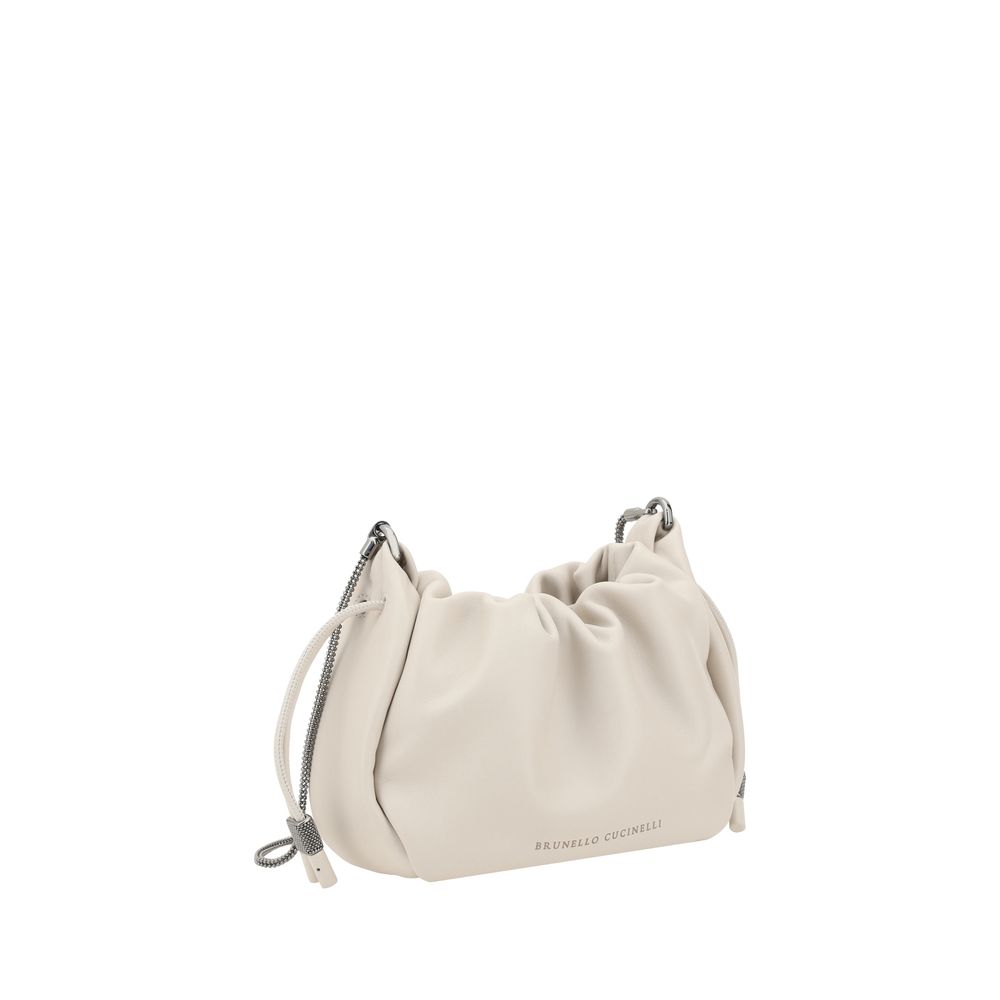 Mini Shoulder Bucket Bag by Brunello Cucinelli for women in bos taurus calf leather beige & monogram features a enviable silhouette, showcasing a secure drawstring, ample single-compartment, and enviable shoulder-strap for a enviable finish.