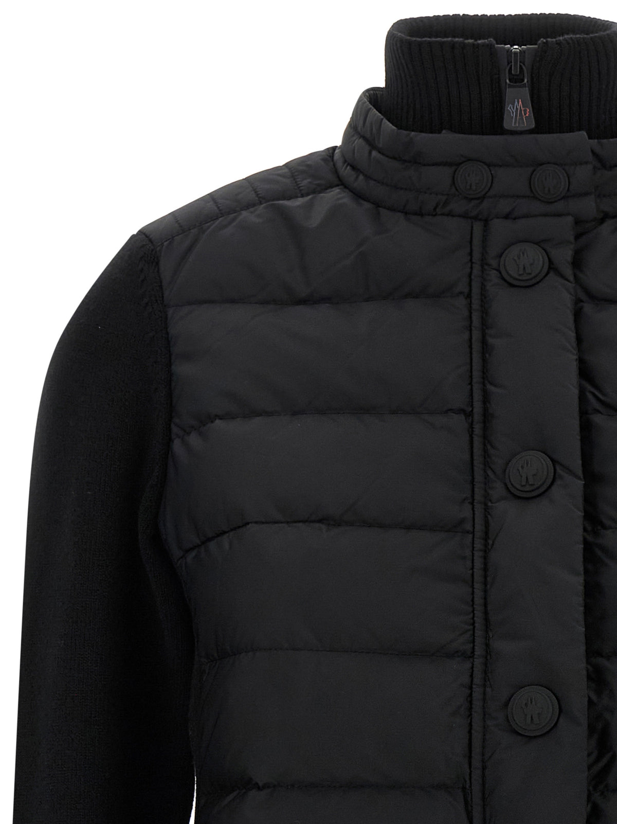 Cardigan by Moncler Grenoble for women in polyamide & virgin wool black showcases a luxurious silhouette, meticulously detailed with a sophisticated high-neck neckline and for a refined finish.