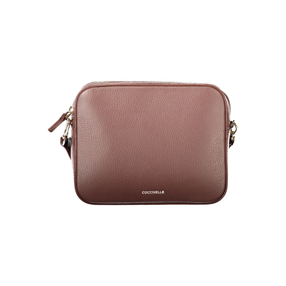 Handbag by Coccinelle for women in leather brown features a signature silhouette, showcasing a secure zipper and signature with versatile shoulder-strap & adjustable-strap for a sophisticated look.