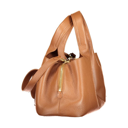 Handbag by Coccinelle for women in leather brown features a exquisite silhouette, showcasing a secure zipper & magnetic and exquisite external-pockets & internal-pockets with versatile shoulder-strap, adjustable-strap & handle for a exquisite finish.