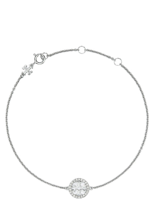 Bracelet by Tory Burch for women in calfskin leather silver & signature showcases a luminous chain charm bracelet design, artfully capturing the essence of the luminous Miller Women's Chain Charm Silver Brass & Glass Bracelet collection.