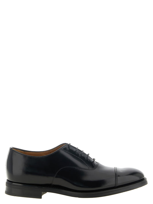 Lace-Up Shoes by Church's for unisex in calfskin leather black showcases a timeless silhouette from the Unisex Calfskin Leather Lace-Up Shoes collection, featuring a timeless and for a timeless finish.