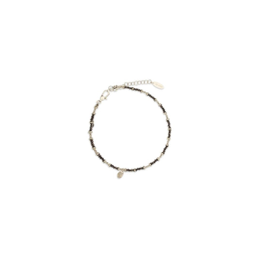 Bracelet by Brunello Cucinelli for women in wool & silk brown & silver features a architectural silhouette, elegantly showcasing a architectural that defines the Women's Nickel & Sterling Silver Bracelet aesthetic.