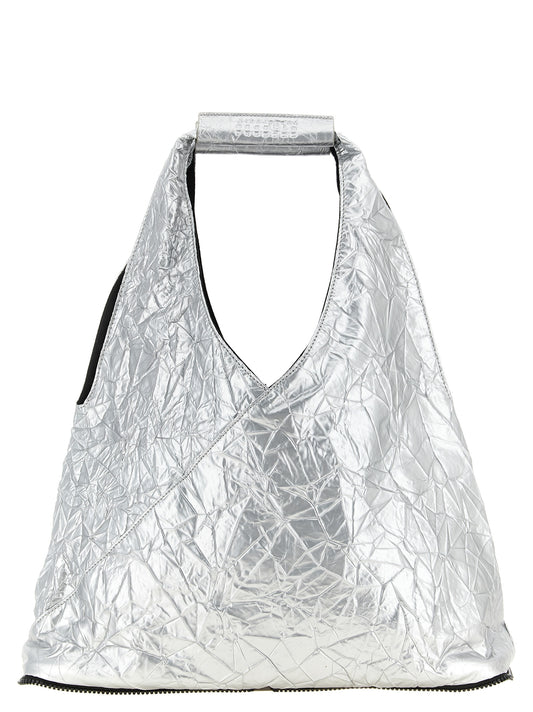 Shopper Pouch Tote Bag by MM6 Maison Margiela for men in polyethylene leather black, silver & signature features a distinguished Japanese Polyethylene Leather Shopper Pouch Tote Bag design, complete with a secure snap, zipper & button, ample , and versatile handle for a distinguished look.