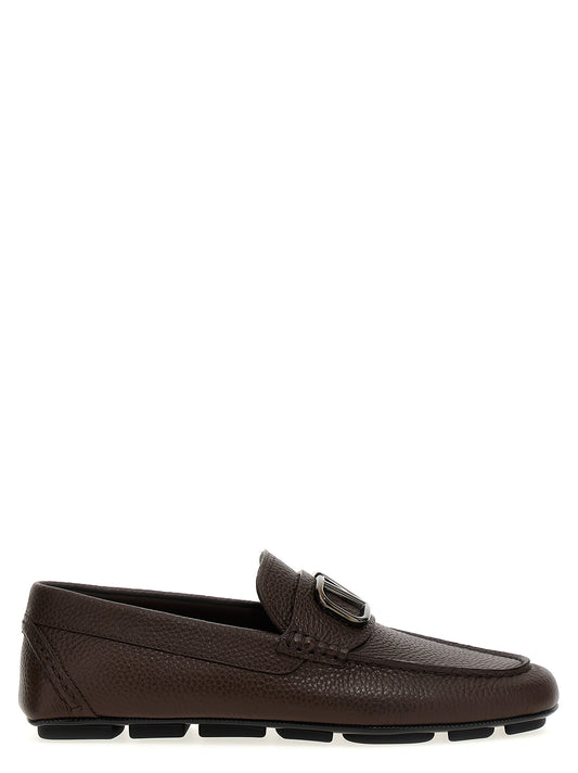 Loafer Slip-On Shoes by Valentino Garavani for men in calfskin leather brown & signature features an effortless chic silhouette, showcasing the V Logo Men's Calfskin Leather Loafer Slip-On Shoes design with an effortless chic and a for a effortless chic look.