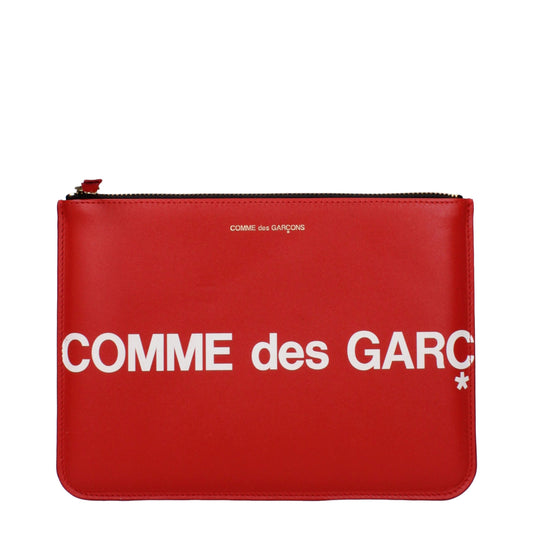 Small Clutch Handbag by Comme Des Garçons for women in leather gold & red features an sculptural silhouette, showcasing a secure zipper and sculptural with versatile for a sophisticated look.
