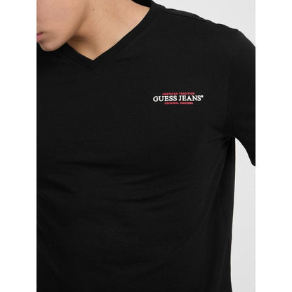 T-Shirt by Guess Jeans for men in cotton black showcases a unassuming silhouette, artfully detailed with a refined and unassuming for a sophisticated, contemporary look.