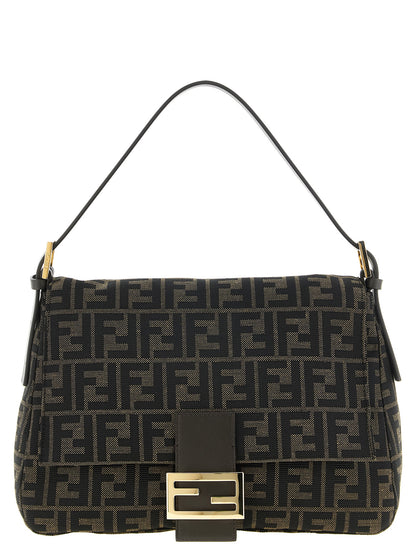 Shoulder Flap Bag by Fendi for women in polyester leather & cotton brown, gold, patterned & jacquard showcases a enviable silhouette, artfully detailed with a secure flap, zipper & buckle, organized , and versatile shoulder-strap, adjustable-strap & handle for a enviable look.