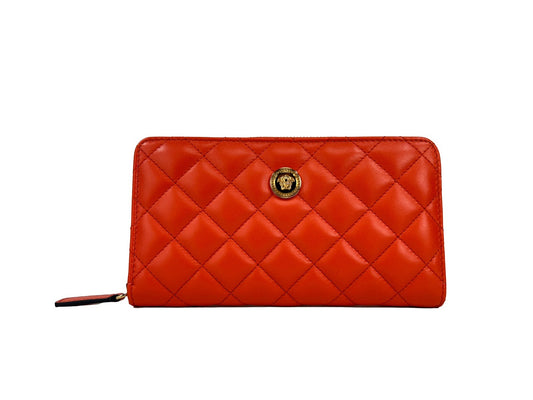 Quilted Clutch Handbag by Versace for women in leather coral & gold features a sculptural silhouette with a secure zipper, ample cardholder, and versatile for a sculptural finish.