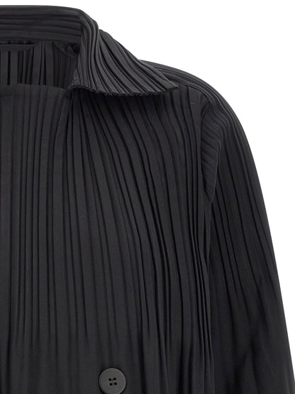 Overcoat by PLEATS PLEASE ISSEY MIYAKE for women in polyester black presents a luxurious silhouette, showcasing a luxurious and sophisticated windproof for a premium, luxurious look.
