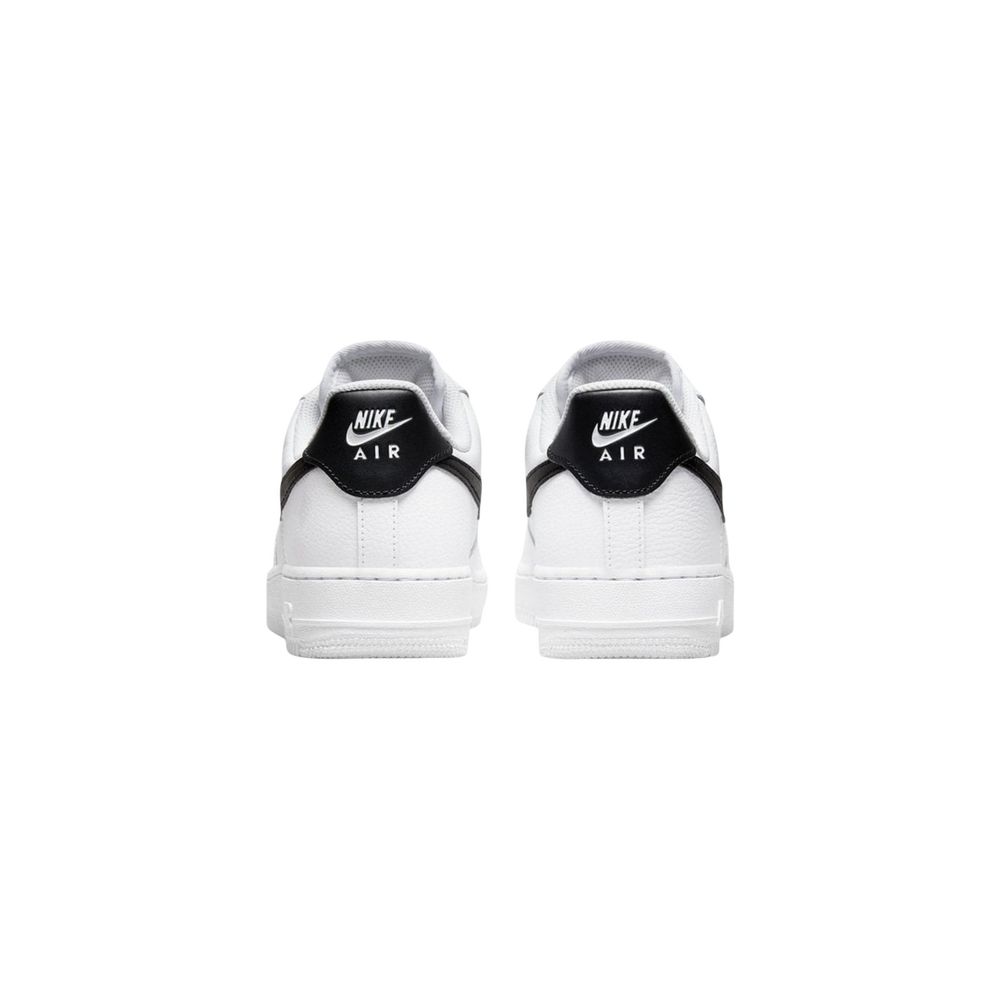Sneakers by Nike for women in leather & rubber black, white & signature presents a impeccable silhouette as Women's Low Top Leather & Rubber Sneakers, expertly defined by a impeccable low-top style for a impeccable, high-fashion look.