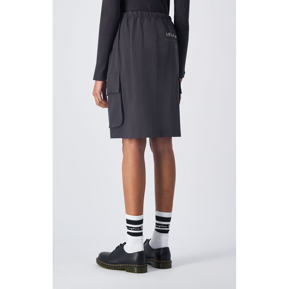 Skirt by Champion for women in stretch polyamide black features an relaxed-yet-refined silhouette that elegantly showcases the Women's Stretch Polyamide Midi Skirt design and sophisticated midi.