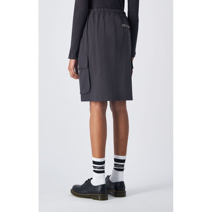 Skirt by Champion for women in stretch polyamide black features an relaxed-yet-refined silhouette that elegantly showcases the Women's Stretch Polyamide Midi Skirt design and sophisticated midi.