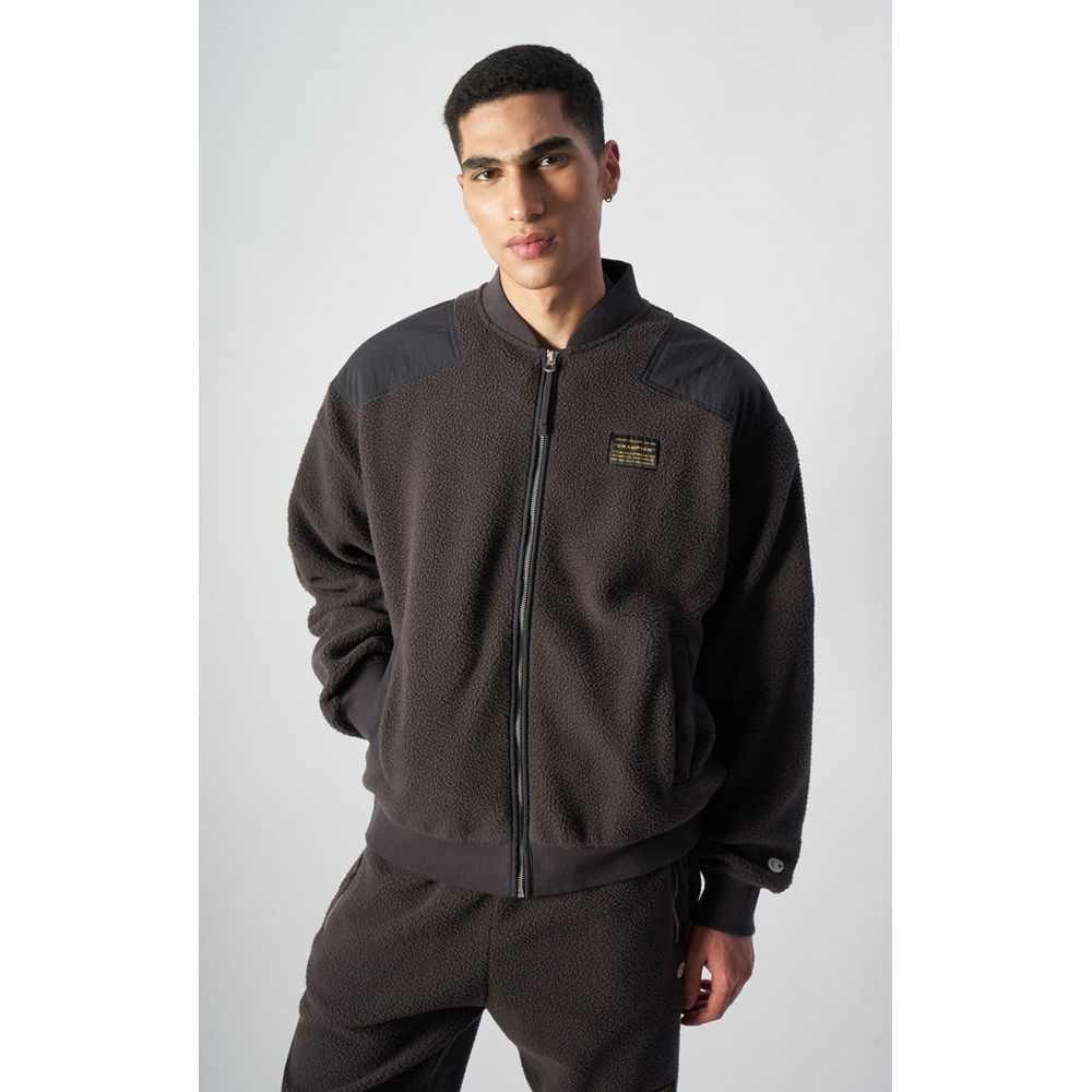 Bomber Jacket by Champion for men in polyester black features a city-ready silhouette, detailed with and a city-ready .