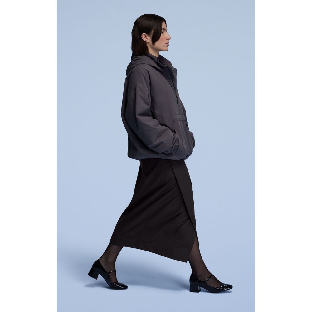 Skirt by Champion for women in polyester blue features a captivating silhouette, showcasing the captivating Women's Polyester Long Skirt design with a sophisticated long for a captivating look.