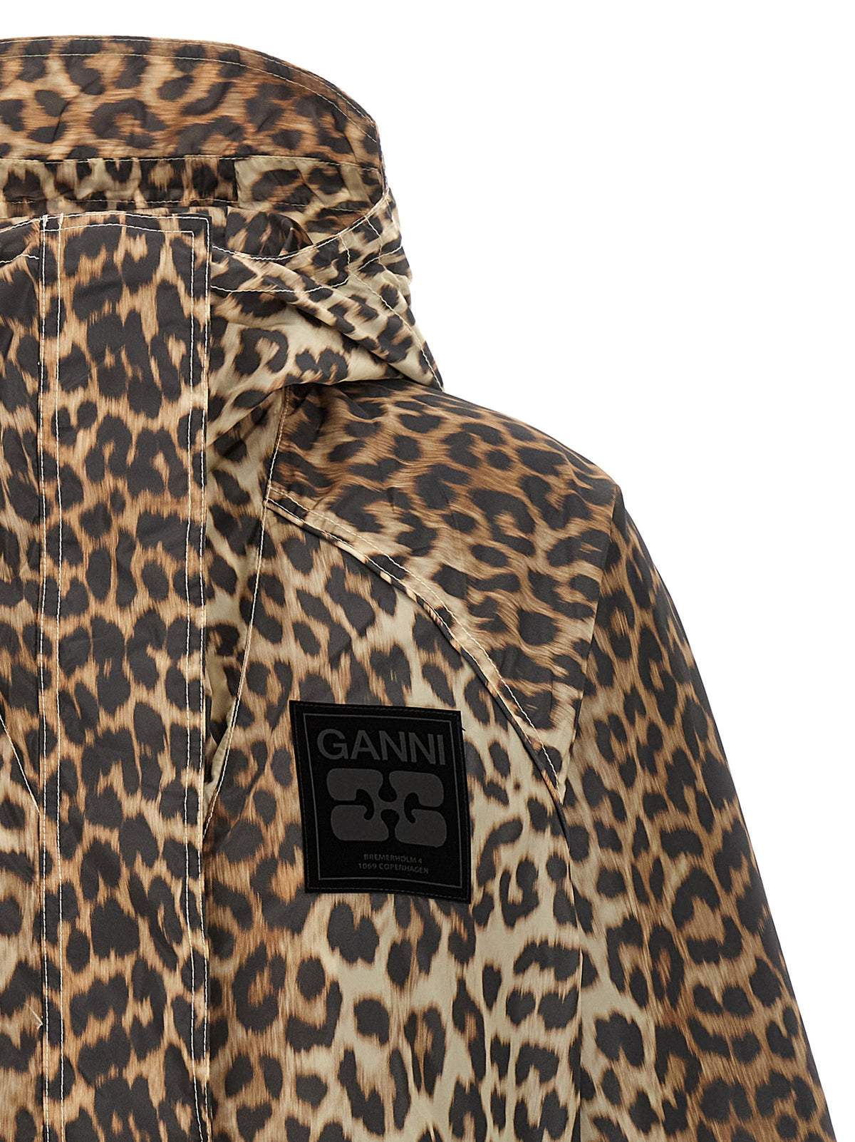 Hooded Windbreaker Jacket by Ganni for women in nylon & silicone animal, multicolor, leopard-print, signature & print features an stylish silhouette, showcasing a sophisticated hooded high-neck neckline and performance-driven pockets, hooded & windproof for a premium, stylish look.