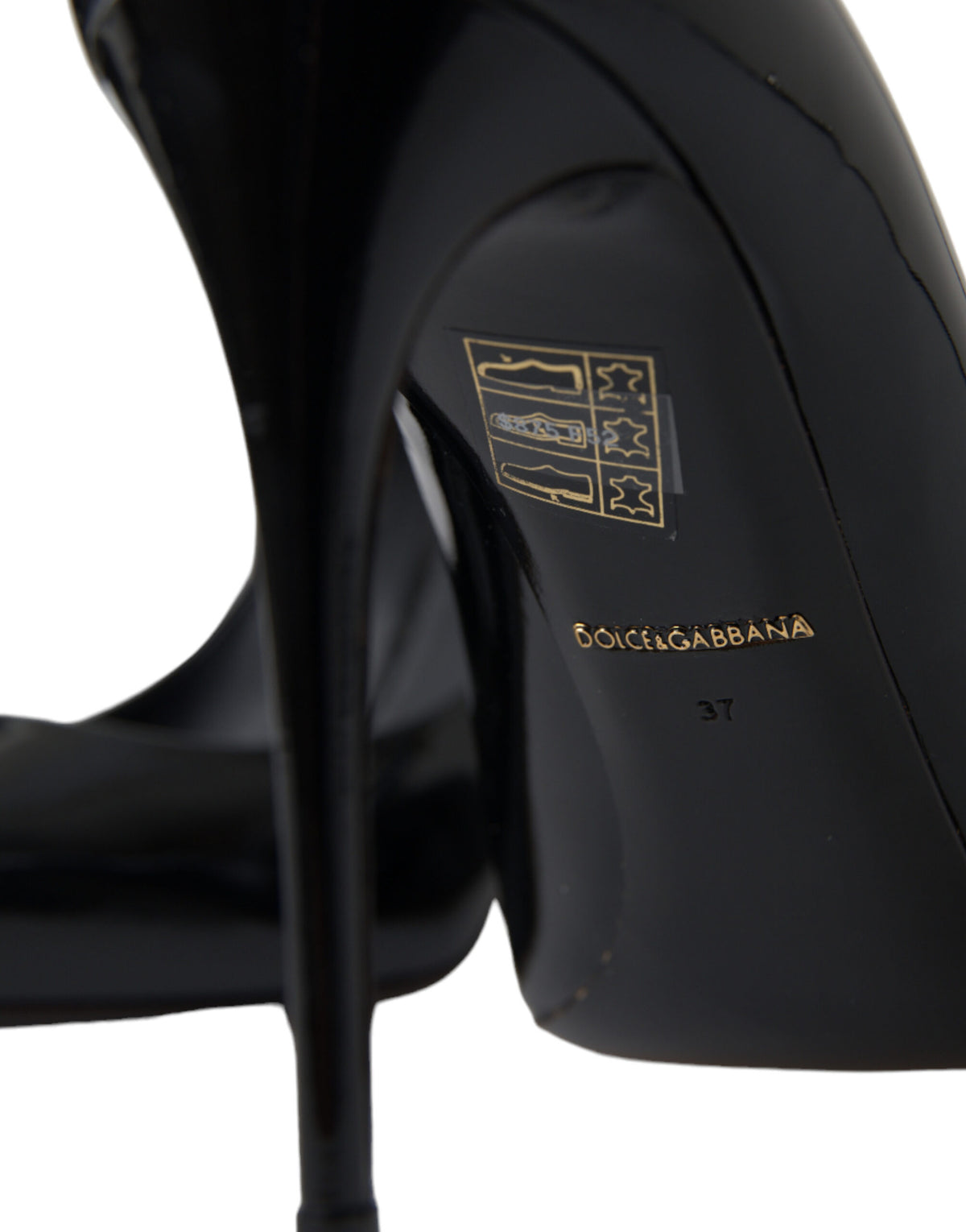 Stiletto Pumps Heels by Dolce & Gabbana for women in patent leather & silk and black showcases a effortlessly elegant silhouette as Icon Women's Patent Leather & Silk Stiletto Pumps Heels, featuring a effortlessly elegant stiletto and a effortlessly elegant for an elegant look.