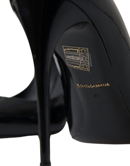 Stiletto Pumps Heels by Dolce & Gabbana for women in patent leather & silk and black showcases a effortlessly elegant silhouette as Icon Women's Patent Leather & Silk Stiletto Pumps Heels, featuring a effortlessly elegant stiletto and a effortlessly elegant for an elegant look.