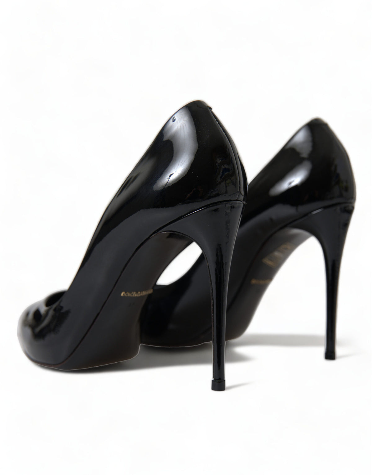 Stiletto Pumps Heels by Dolce & Gabbana for women in patent leather & silk black features a effortless chic silhouette, showcasing the Icon Women's Patent Leather & Silk Stiletto Pumps Heels design with a effortless chic stiletto and for a effortless chic finish.