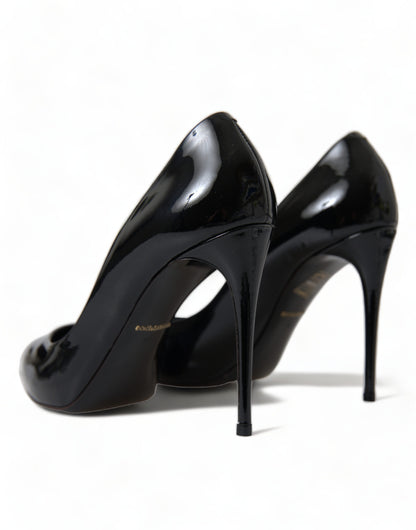 Stiletto Pumps Heels by Dolce & Gabbana for women in patent leather & silk black features a effortless chic silhouette, showcasing the Icon Women's Patent Leather & Silk Stiletto Pumps Heels design with a effortless chic stiletto and for a effortless chic finish.