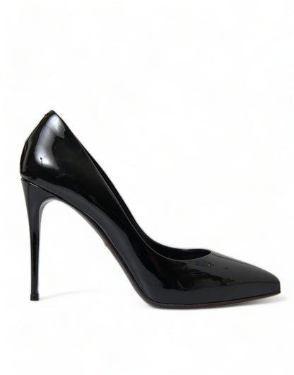 Stiletto Pumps Heels by Dolce & Gabbana for women in patent leather & silk black features an captivating silhouette, showcasing the elegant Icon Women's Patent Leather & Silk Stiletto Pumps Heels design with a stiletto and a sophisticated .