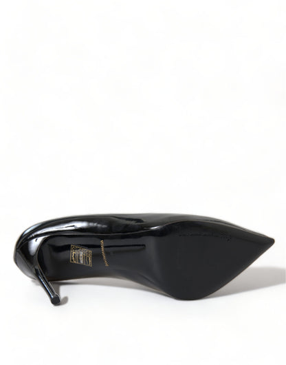 This Stiletto Pumps Heels by Dolce & Gabbana for women in patent leather & silk black presents a effortlessly chic silhouette from the Icon Women's Patent Leather & Silk Stiletto Pumps Heels collection, featuring a effortlessly chic stiletto and effortlessly chic .