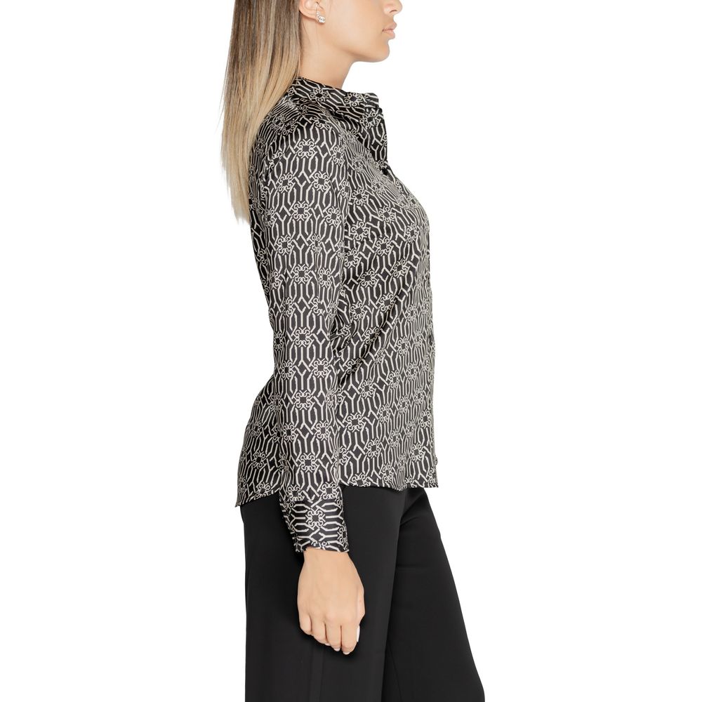 Shirt by Rinascimento for women in polyester black showcases a sharp silhouette, elegantly detailed with a sharp and sharp .