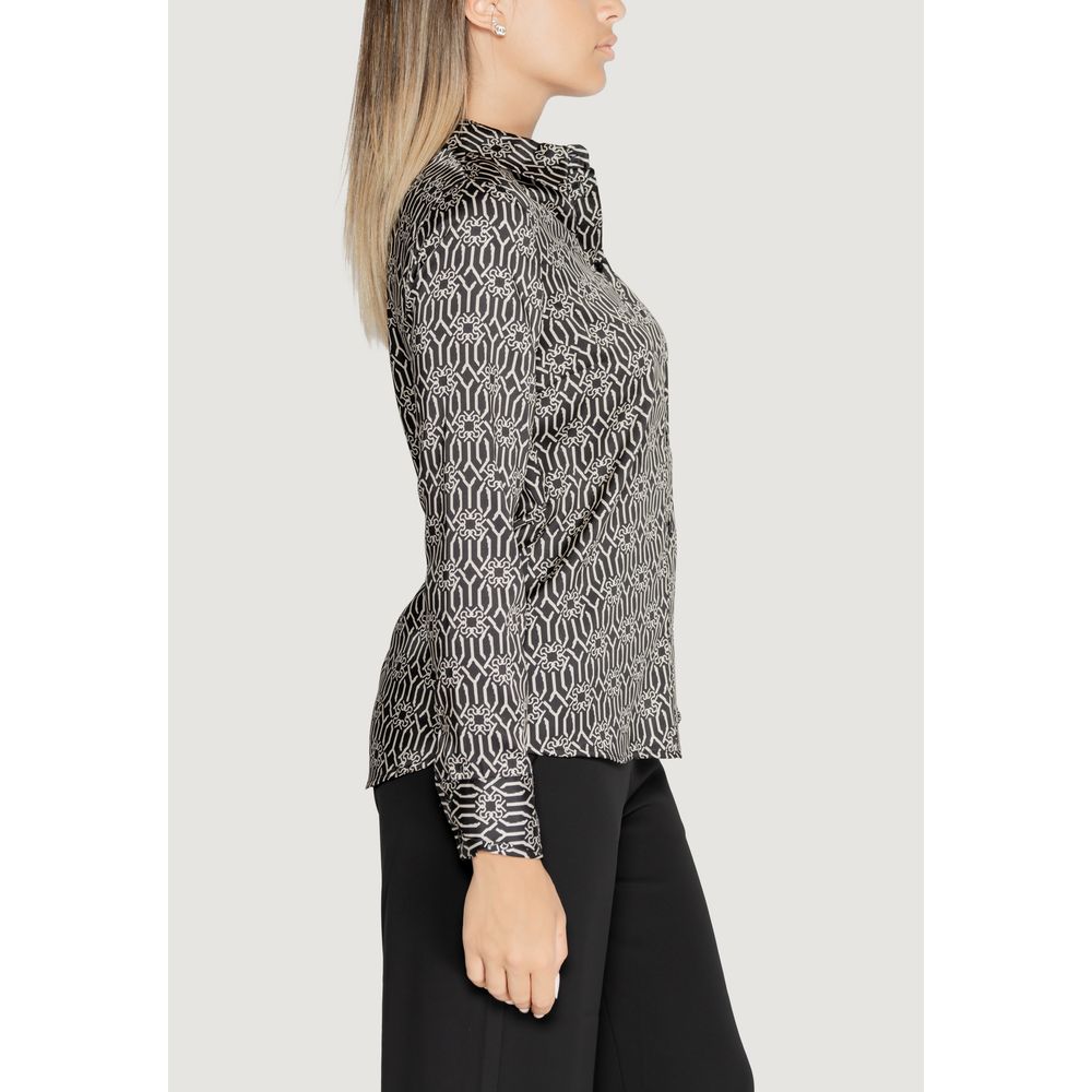 Shirt by Rinascimento for women in polyester black presents a discerning silhouette, showcasing a sophisticated and for a truly discerning finish.
