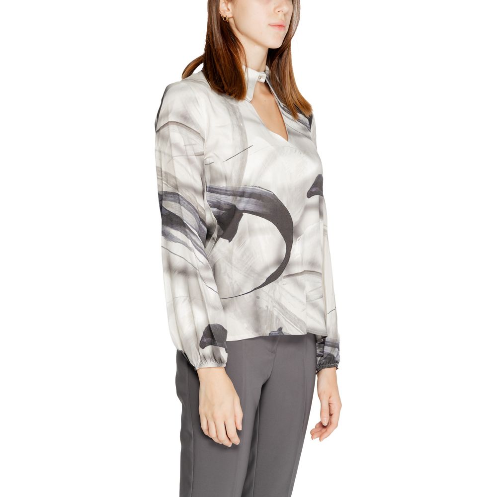 Shirt by Rinascimento for women in viscose gray presents a discerning silhouette, showcasing a sophisticated and for a truly discerning finish.