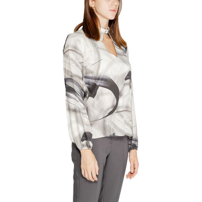 Shirt by Rinascimento for women in viscose gray presents a discerning silhouette, showcasing a sophisticated and for a truly discerning finish.
