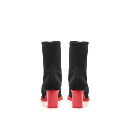 High-Heel Sock Ankle Boots by Alexander McQueen for women in neoprene black features an dynamic silhouette, showcasing the dynamic Women's Neoprene High-Heel Sock Ankle Boots design with its distinctive 10-cm-heel high-heel and elegant round toe style.