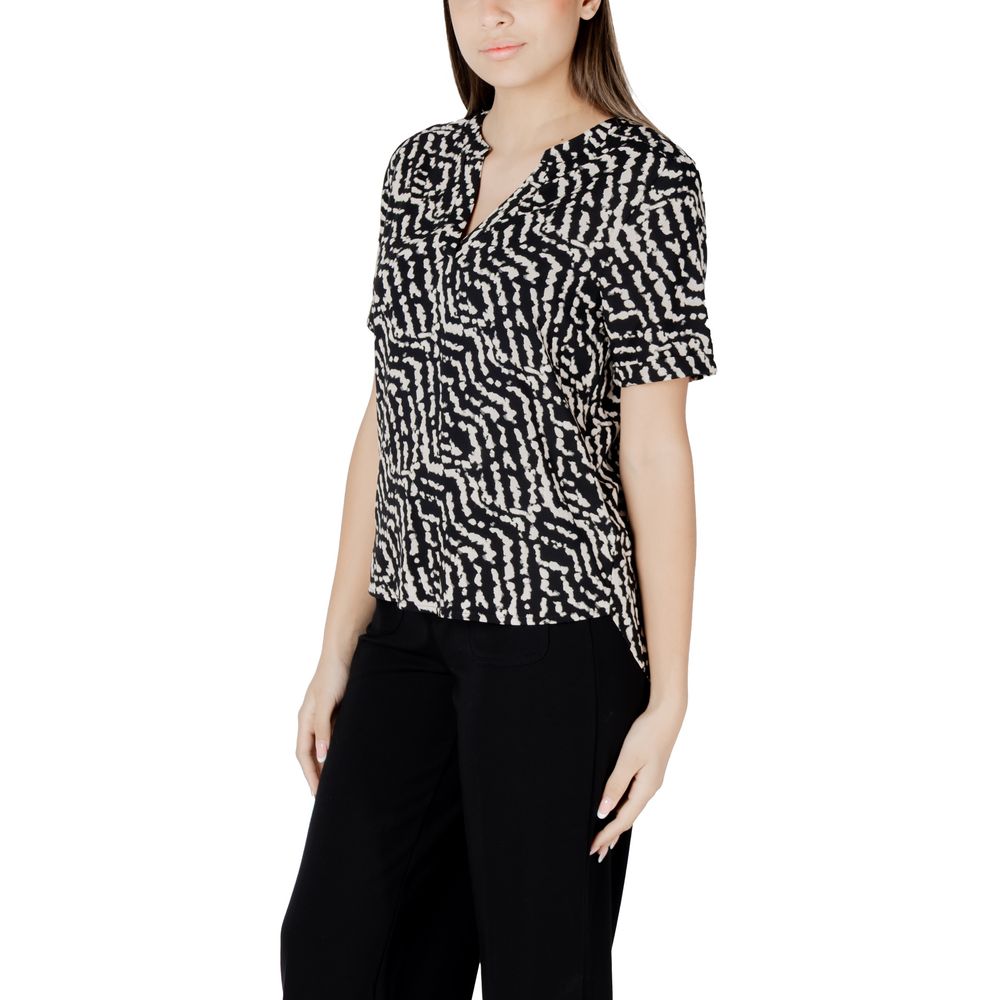 Shirt by Street One for women in viscose black showcases a sleek silhouette, elegantly detailed with a sleek v-neck neckline and for a sleek finish.