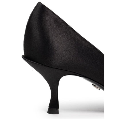 Pumps Heels by Dolce & Gabbana for women in viscose black features a effortlessly chic Women's Viscose Pumps Heels design with a sophisticated and elegant .