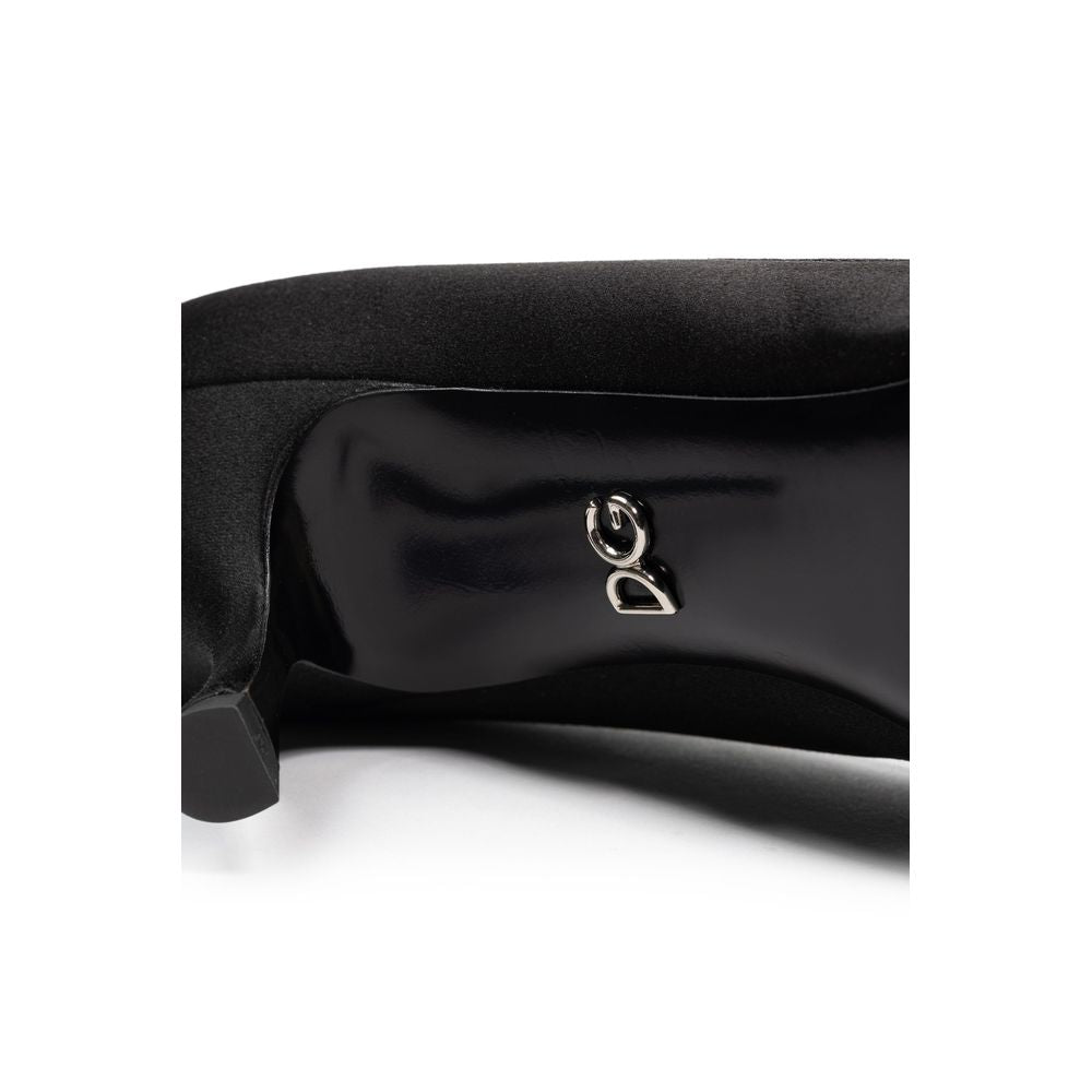 Pumps Heels by Dolce & Gabbana for women in viscose black features an effortlessly chic silhouette from the Women's Viscose Pumps Heels collection, showcasing a and effortlessly chic for a effortlessly chic look.