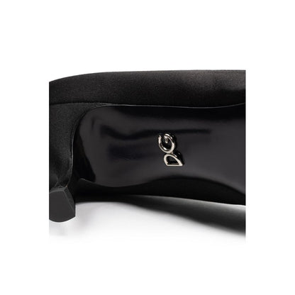 Pumps Heels by Dolce & Gabbana for women in viscose black features an effortlessly chic silhouette from the Women's Viscose Pumps Heels collection, showcasing a and effortlessly chic for a effortlessly chic look.