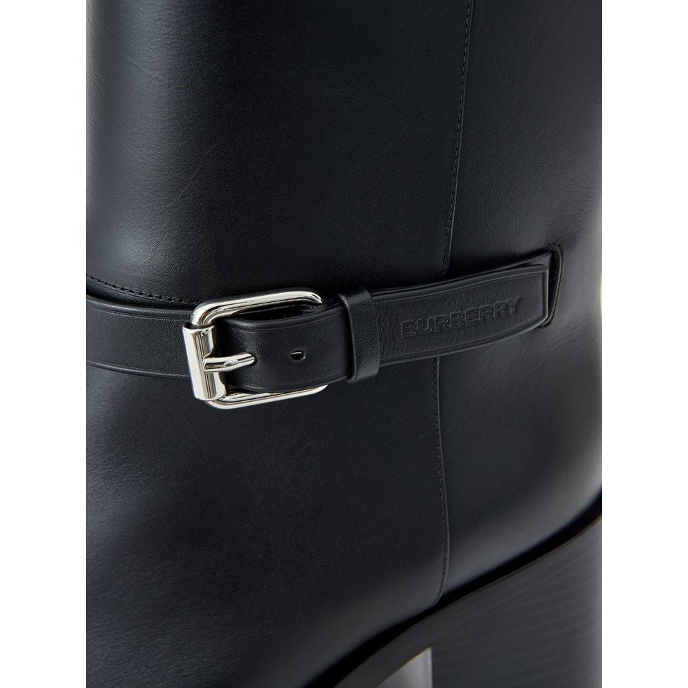 Ankle Strap Boots by Burberry for women in leather black & print features an enchanting design from the Women's Leather Ankle Strap Boots collection, highlighting a enchanting and round toe style for a refined look.