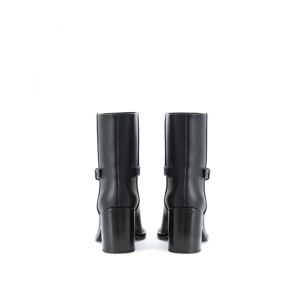 Ankle Strap Boots by Burberry for women in leather black & print features an effortless chic silhouette from the Women's Leather Ankle Strap Boots collection, showcasing a effortless chic and refined round toe style for an effortless chic look.