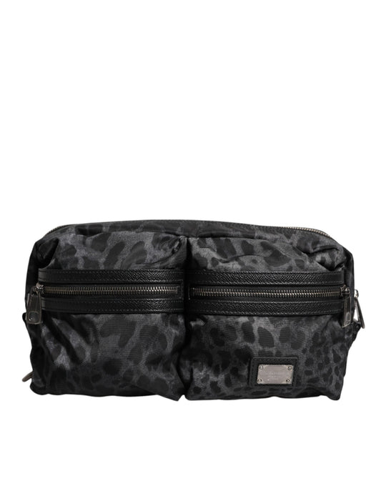 Fanny Pack Backpack by Dolce & Gabbana for men in calf leather & nylon black & gray features a refined silhouette, showcasing the Calf Leather Nylon Fanny Pack Backpack design with a secure zipper, ample , and versatile adjustable-strap & belt-strap.