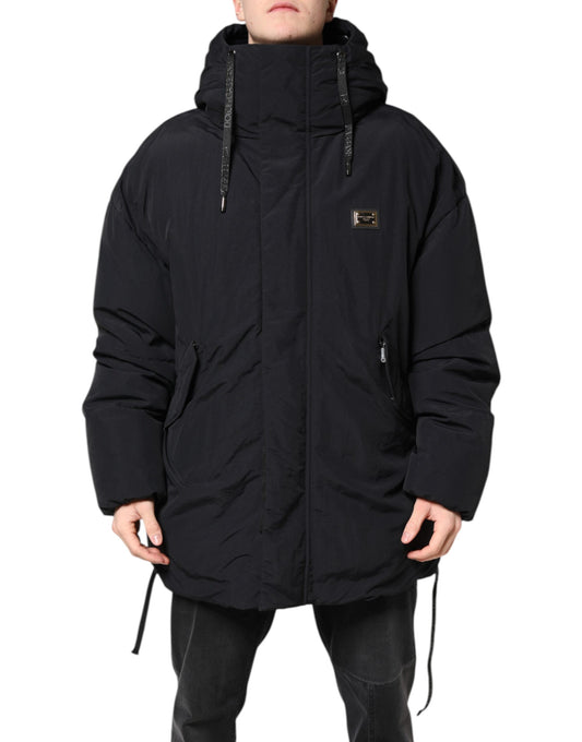 Hooded Parka by Dolce & Gabbana for men in nylon black presents a decadent silhouette, showcasing the decadent hooded neckline and functional hooded for a premium, weather-ready look.
