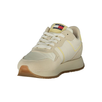Athletic Sneakers Tommy Hilfiger women polyester polyethylene leather beige featuring a avant-garde Women's Athletic Polyester Polyethylene Leather Sneakers design with a avant-garde athletic style for a refined finish.