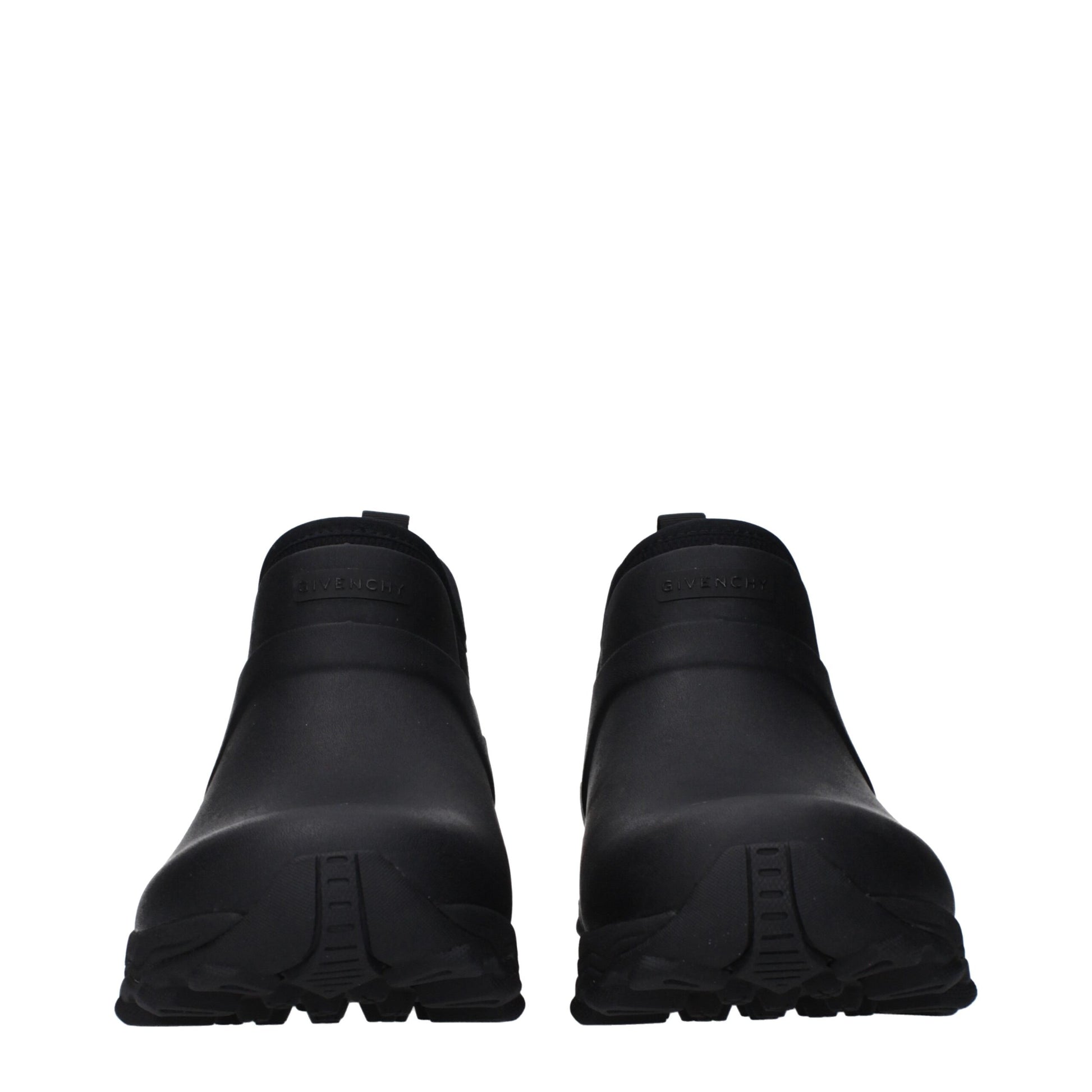 Flat Ankle Boots by Givenchy for men in cotton & rubber black features an effortless chic silhouette from the Men's Cotton & Rubber Flat Ankle Boots collection, showcasing a effortless chic flat and refined round toe style for an effortless chic look.