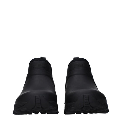 Flat Ankle Boots by Givenchy for men in cotton & rubber black features an effortless chic silhouette from the Men's Cotton & Rubber Flat Ankle Boots collection, showcasing a effortless chic flat and refined round toe style for an effortless chic look.