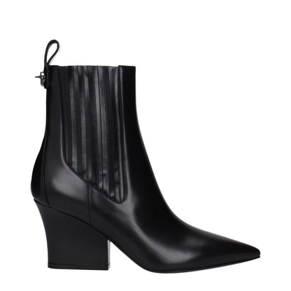 Mid-Heel Ankle Boots by Valentino Garavani for women in leather black features an effortless chic silhouette from the Women's Leather Mid-Heel Ankle Boots collection, showcasing a effortless chic 7-5-cm-heel mid-heel and refined for an effortless chic look.