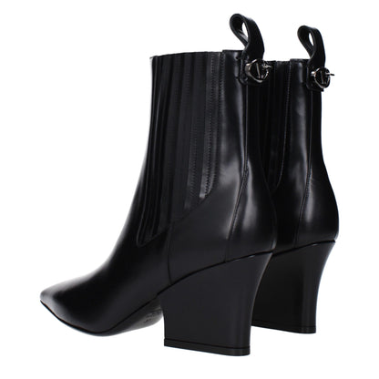 Mid-Heel Ankle Boots by Valentino Garavani for women in leather black features an dynamic silhouette, showcasing the dynamic Women's Leather Mid-Heel Ankle Boots design with its distinctive 7-5-cm-heel mid-heel and elegant .