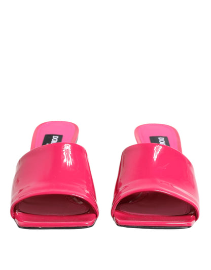 Mules Sandals by Dolce & Gabbana for women in calf leather gold & pink presents a sculptural silhouette, showcasing the Women's Calf Leather Mules Sandals design with a sculptural block-heel and open toe style for a premium look.